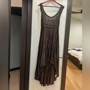 Free people intimately high low black dress with gold & silver threads. Size XS